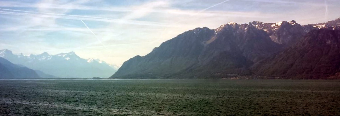 Edited photo of Lake Geneva, outside of Montreaux, Switzerland, with the Alps in the background.
